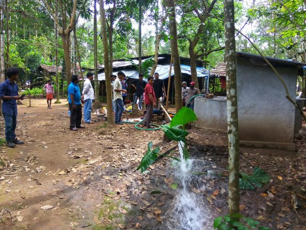 NSS volunteers and staff members help flood-affected residents of Vellikullangara Tribal Colony