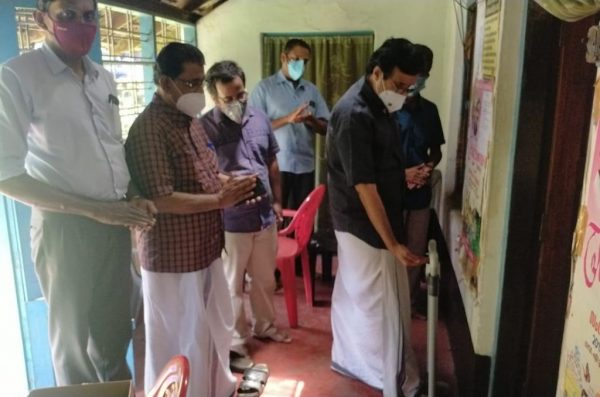 Vidya Skill Centre's foot-operated sanitizer dispenser installed at the Puthukkad Camp of Ed'n Minister