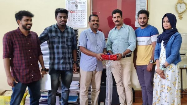 Outgoing students present an Onam gift to MCA Dept!