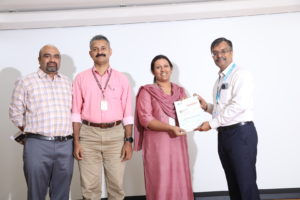 Ms. Jucy Vareed and Mr. Manesh D receiving the Academic Membreship certificate from ICTAK CEO Mr. Santhosh Kurup