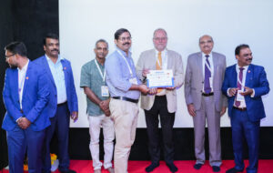 Assistant Prof. Mr. Sangeeth KK, VAST, receiving the Certificate from Prof. Karl-Heinz Noetel.
